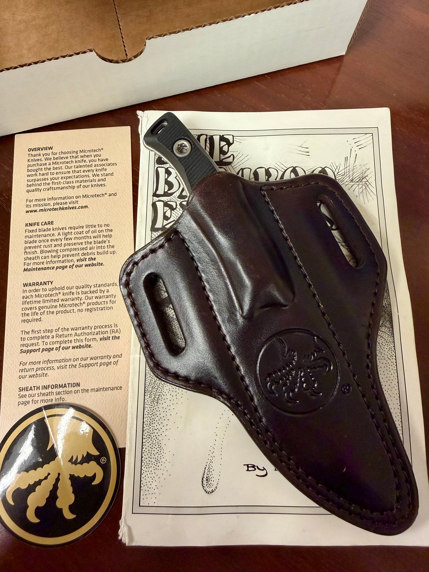 Microtech Akris Fixed Blade – Stonewash M390MK, Black G-10, Leather Sheath